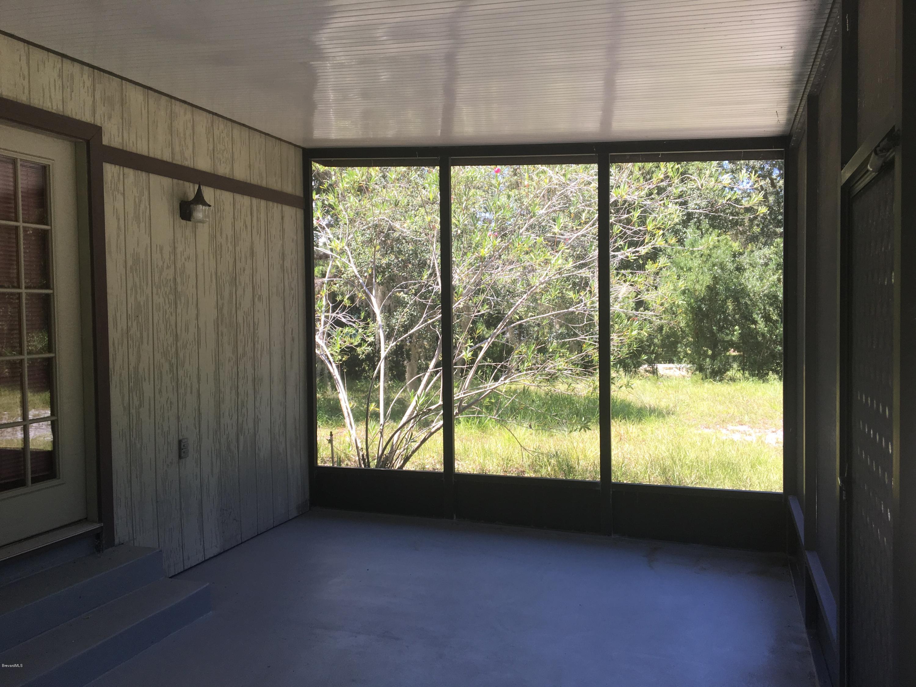 3485 Turtle Mound Road Melbourne, FL 32934 - Photo 29 of 30 Screened Porch