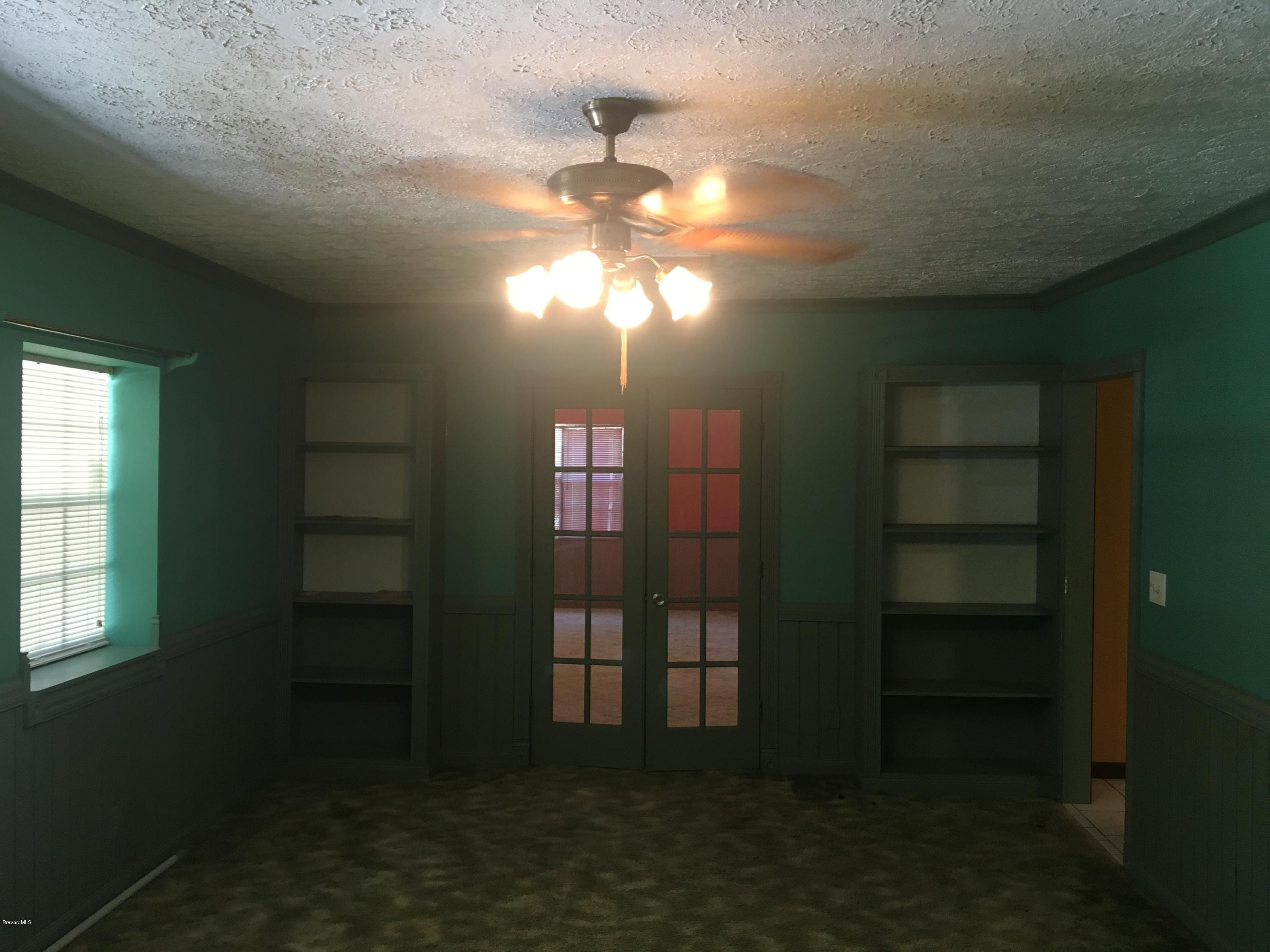 3485 Turtle Mound Road Melbourne, FL 32934 - Photo 6 of 30 Living Room/Media/Study