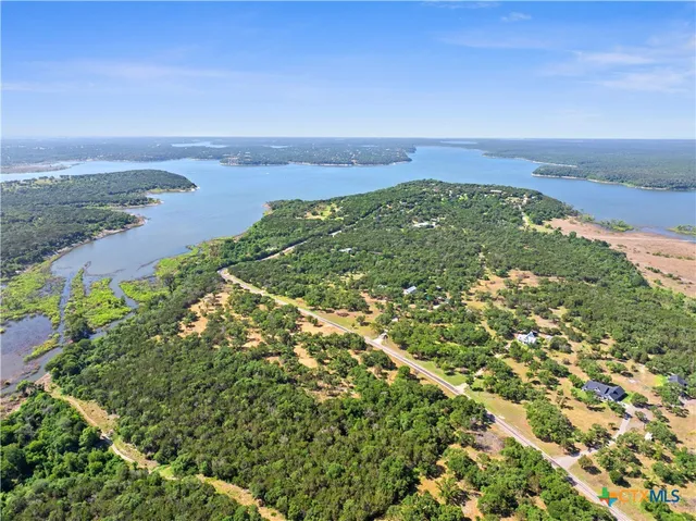 an aerial view of beach and ocean