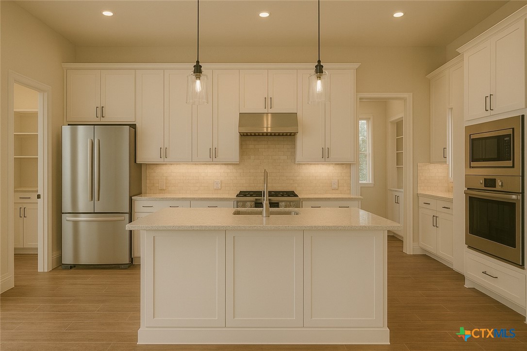 Tbd Owl Creek Park Road Gatesville, TX 76528 - Photo 3 of 27 a kitchen with kitchen island a counter top space stainless steel appliances and cabinets