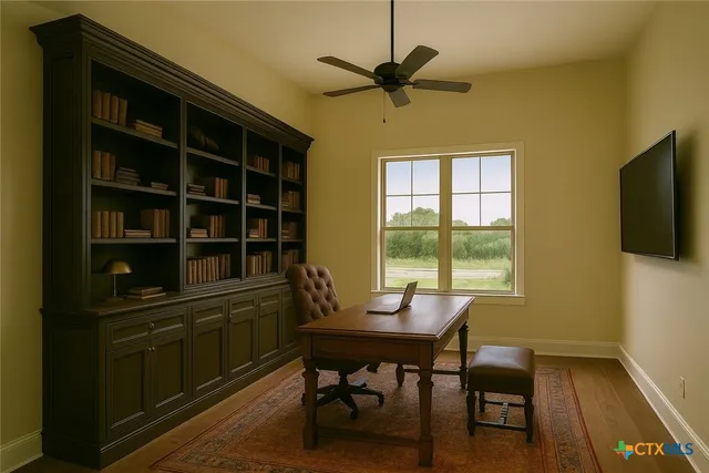 a workspace with furniture and a window