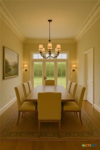 a dining room with furniture a chandelier and wooden floor
