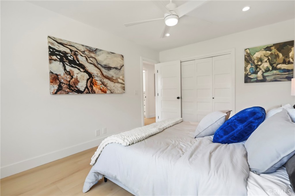 2316 La Linda Place Newport Beach, CA 92660 - Photo 15 of 31 a bedroom with a bed and a painting on the wall