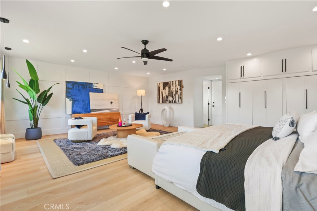 2316 La Linda Place Newport Beach, CA 92660 - Photo 19 of 31 a bedroom with a large bed and a couch