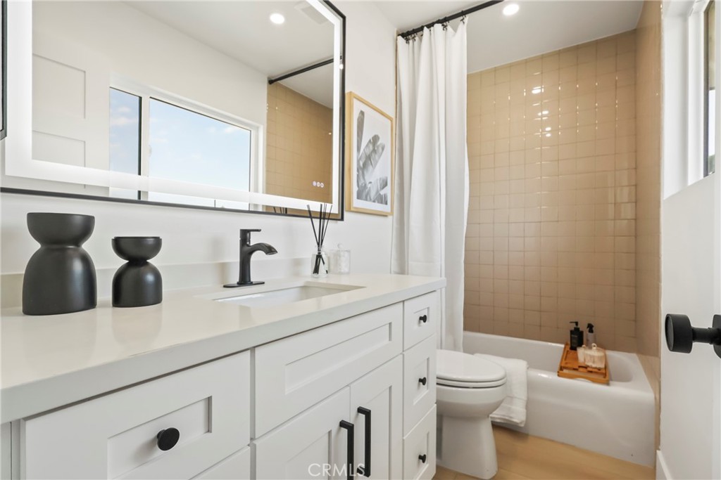 2316 La Linda Place Newport Beach, CA 92660 - Photo 20 of 31 a bathroom with a sink and a toilet
