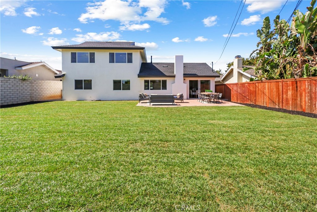 2316 La Linda Place Newport Beach, CA 92660 - Photo 2 of 31 a house view with a sitting space and garden