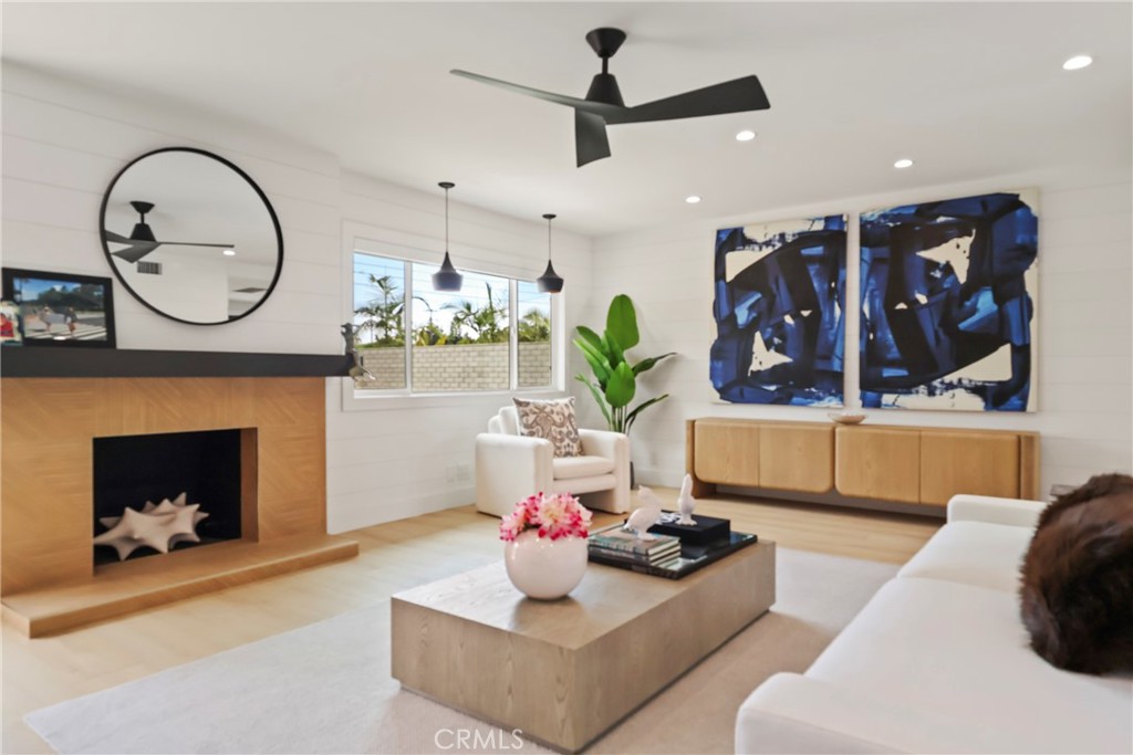 2316 La Linda Place Newport Beach, CA 92660 - Photo 26 of 31 a living room with furniture and a fireplace