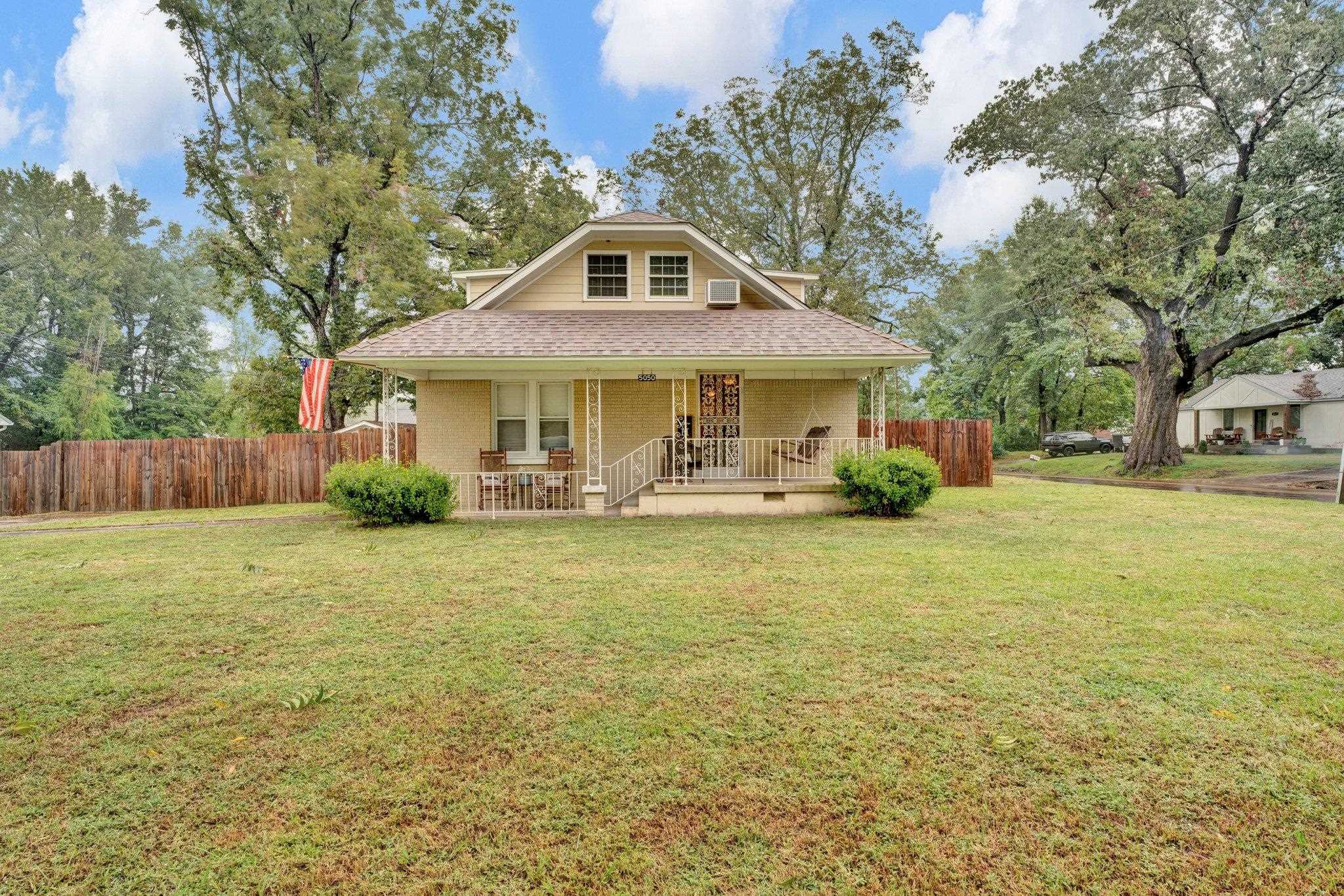 5050 Brunswick Road Bartlett, TN 38002 - Photo 1 of 35 a front view of a house with garden