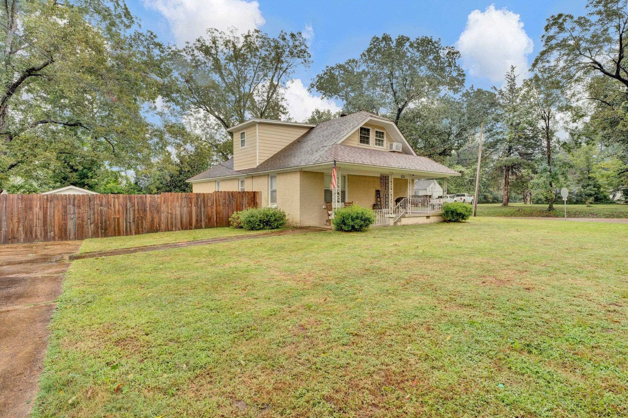 5050 Brunswick Road Bartlett, TN 38002 - Photo 2 of 35 a front view of a house with a garden