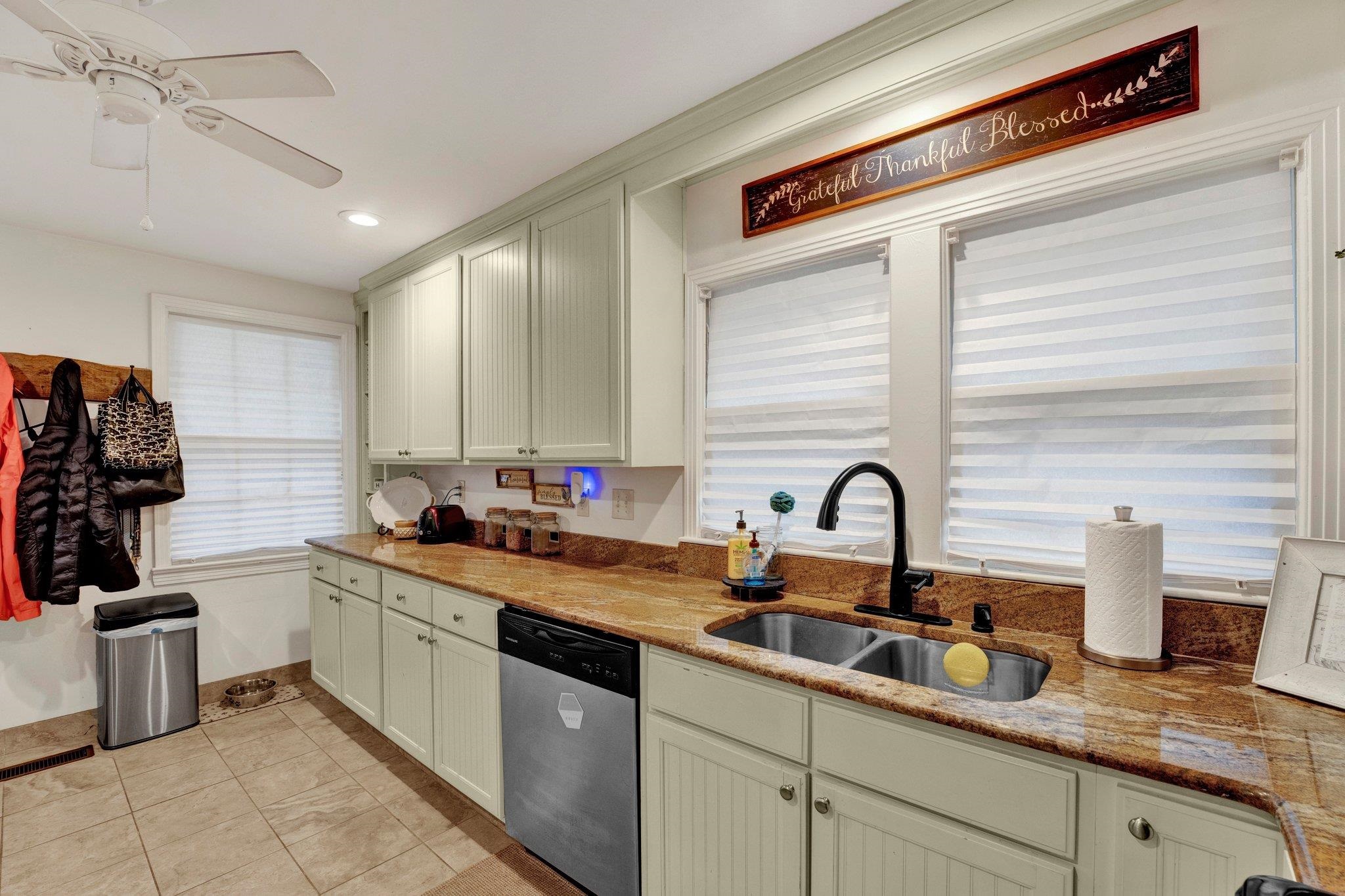 5050 Brunswick Road Bartlett, TN 38002 - Photo 23 of 35 a kitchen with a sink and a refrigerator