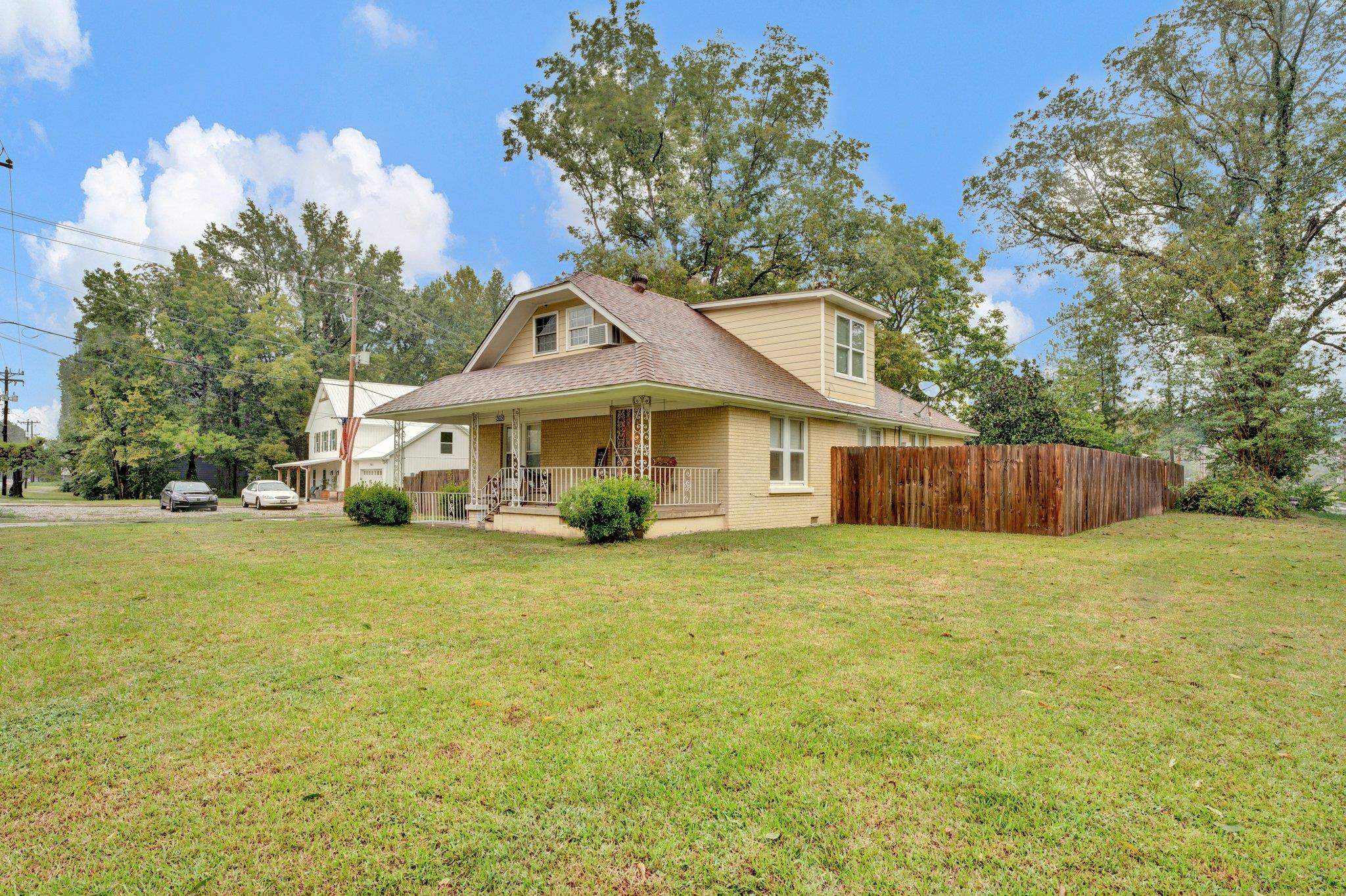 5050 Brunswick Road Bartlett, TN 38002 - Photo 3 of 35 a front view of a house with a garden