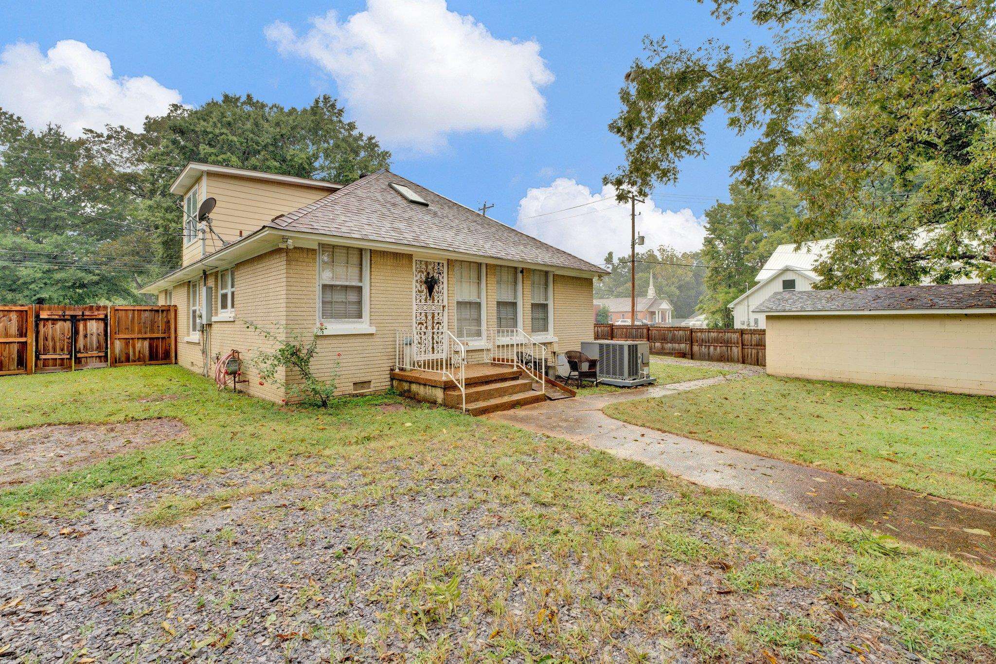 5050 Brunswick Road Bartlett, TN 38002 - Photo 31 of 35 a view of a house with a yard