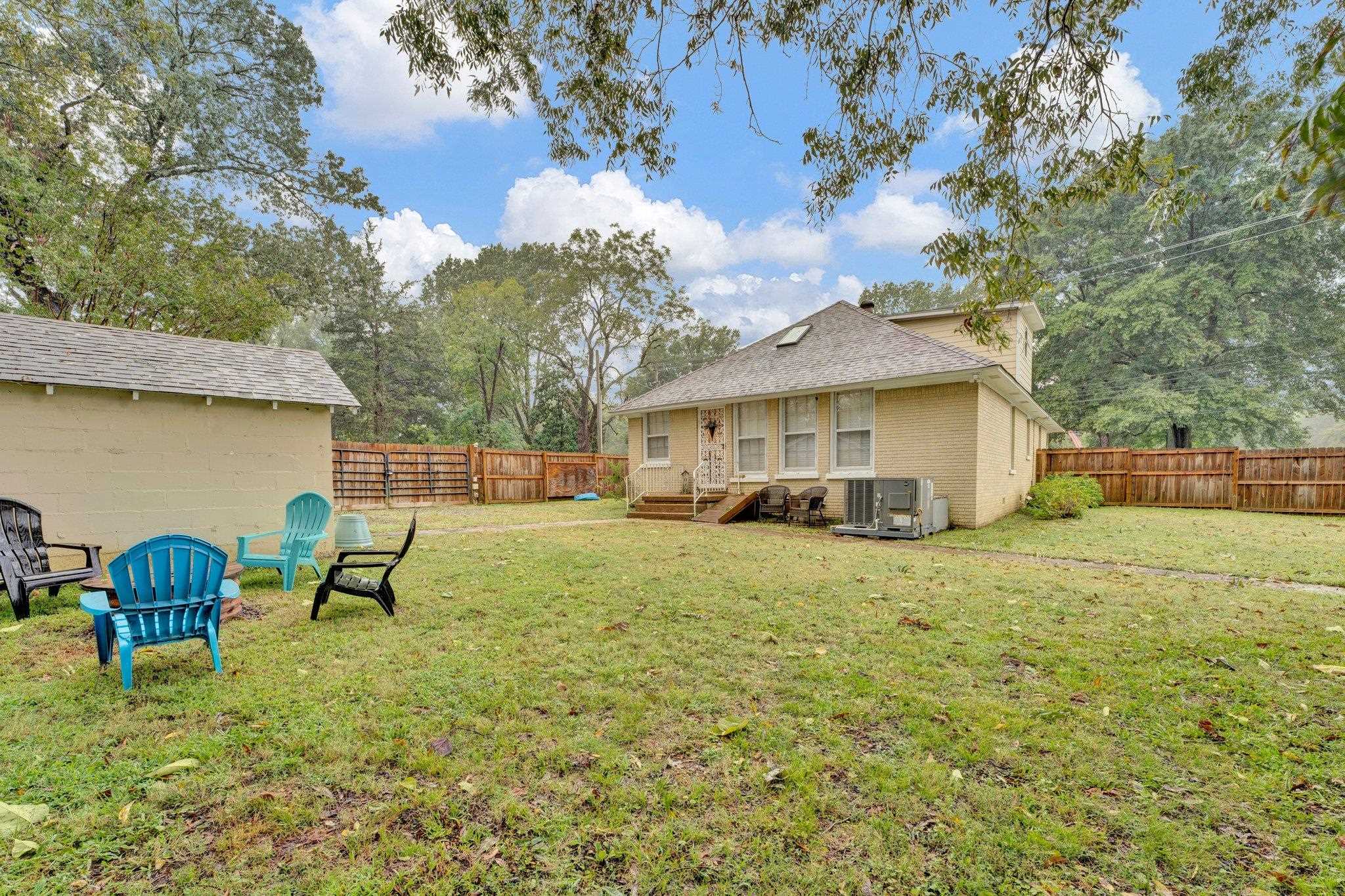 5050 Brunswick Road Bartlett, TN 38002 - Photo 32 of 35 a front view of a house with a yard