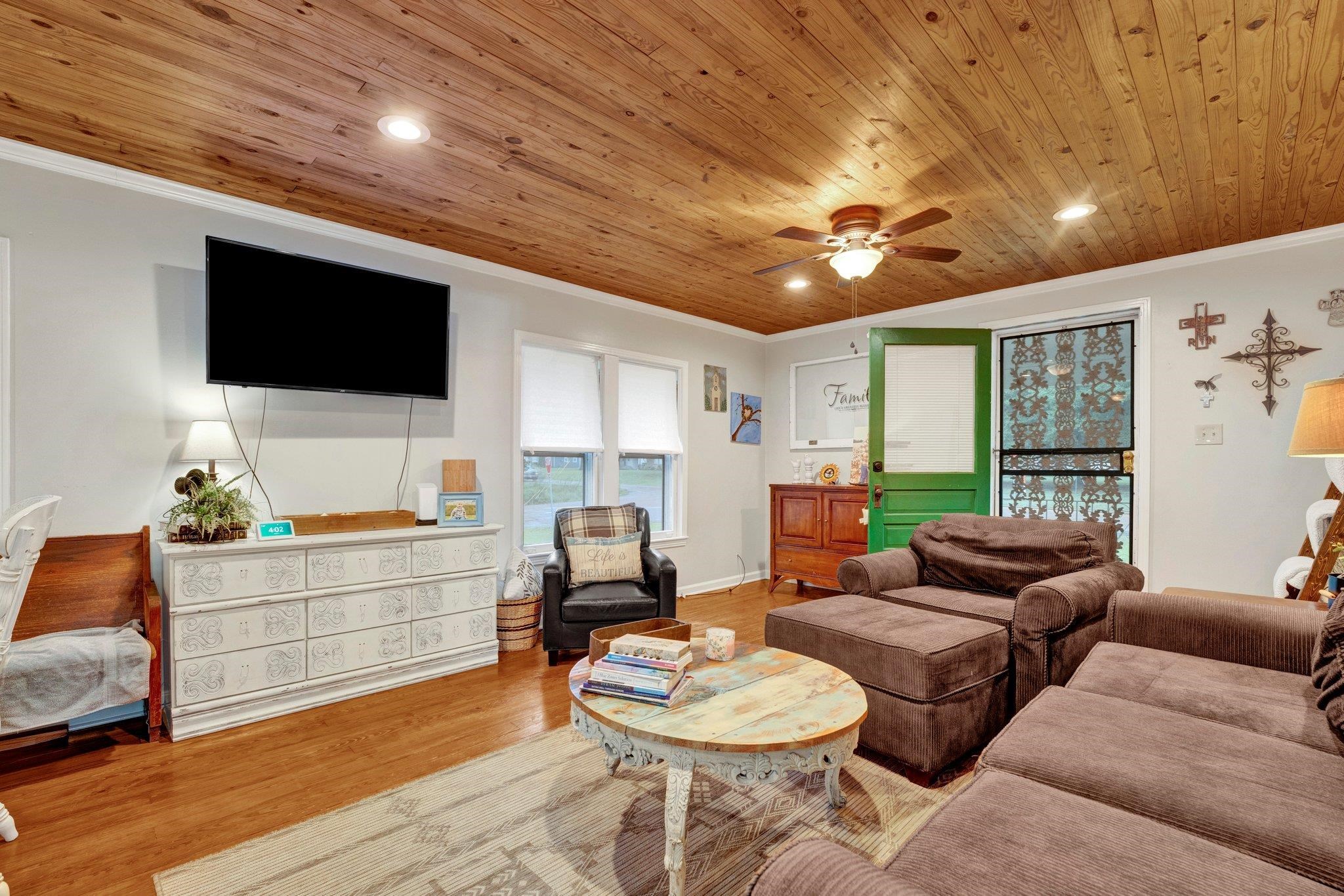 5050 Brunswick Road Bartlett, TN 38002 - Photo 8 of 35 a living room with furniture a flat screen tv and kitchen view