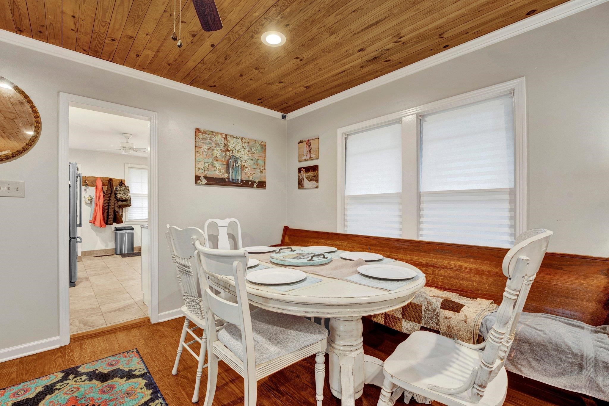 5050 Brunswick Road Bartlett, TN 38002 - Photo 9 of 35 a view of a dining room with furniture and wooden floor