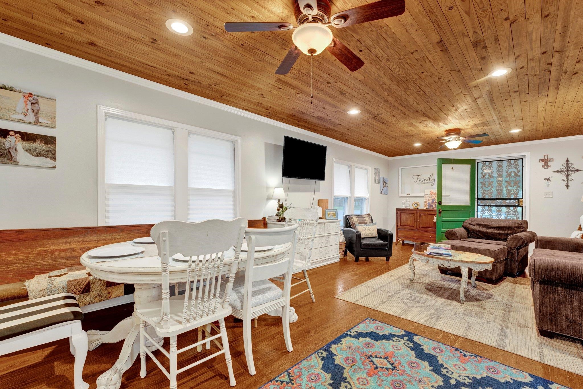 5050 Brunswick Road Bartlett, TN 38002 - Photo 10 of 35 a living room with furniture a flat screen tv and kitchen view