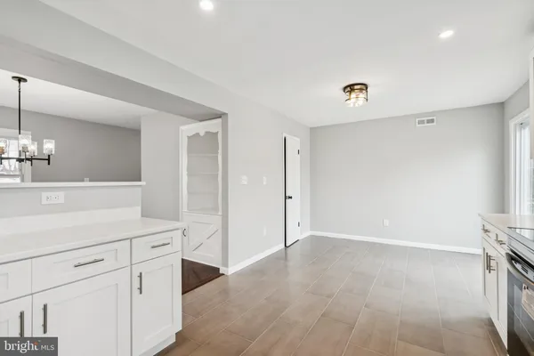 a view of a kitchen with a sink