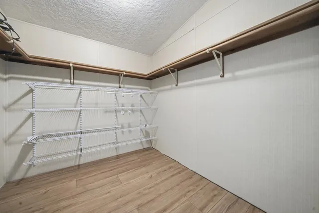 a view of a room with racks on the wall