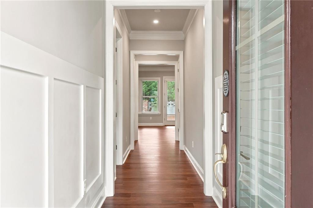 2070 Abbey Road Roswell, GA 30076 - Photo 4 of 65 a view of a hallway with wooden floor