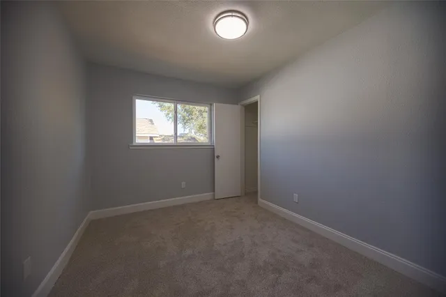 a bathroom with a sink vanity and a mirror