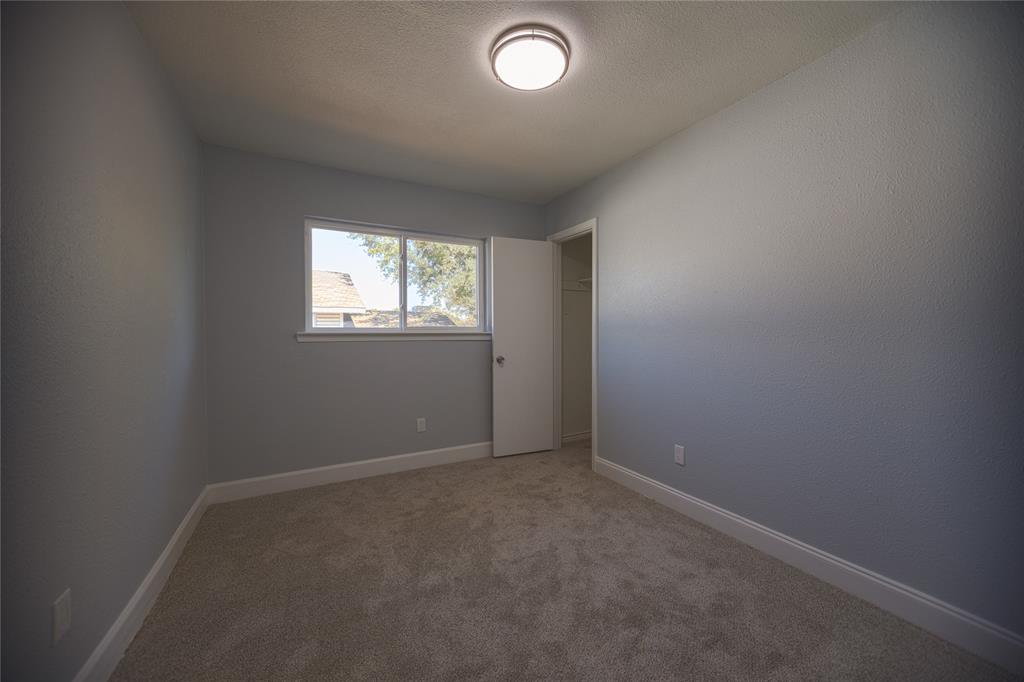 733 Intrepid Drive Garland, TX 75043 - Photo 15 of 25 Upstairs 2nd bedroom