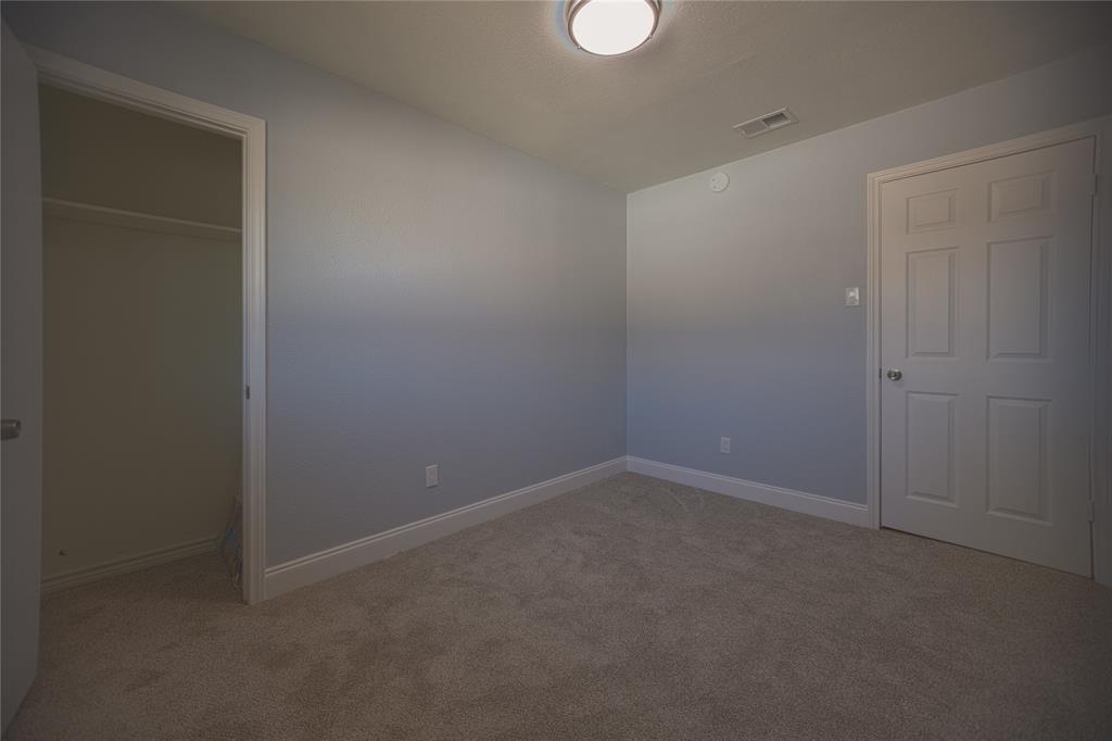 733 Intrepid Drive Garland, TX 75043 - Photo 16 of 25 Upstairs 3rd bedroom with carpet floors