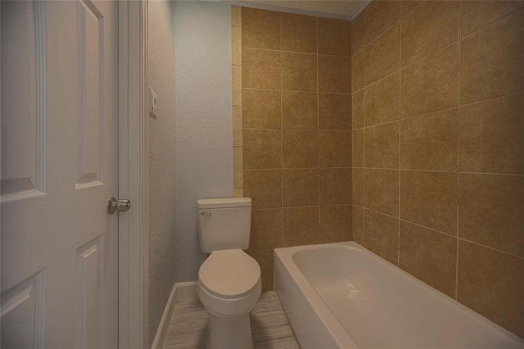733 Intrepid Drive Garland, TX 75043 - Photo 18 of 25 Upstairs bathroom