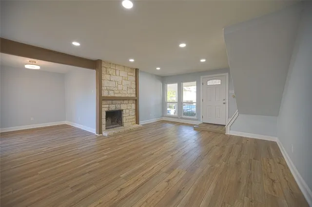 a kitchen with a sink cabinets and window