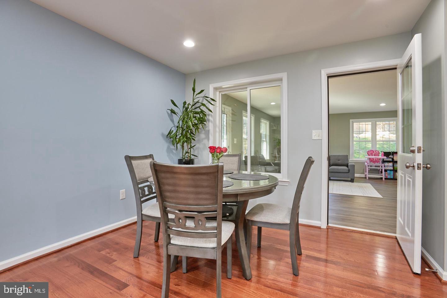 1007 Venice Drive Silver Spring, MD 20904 - Photo 14 of 39 a dining room with furniture and wooden floor