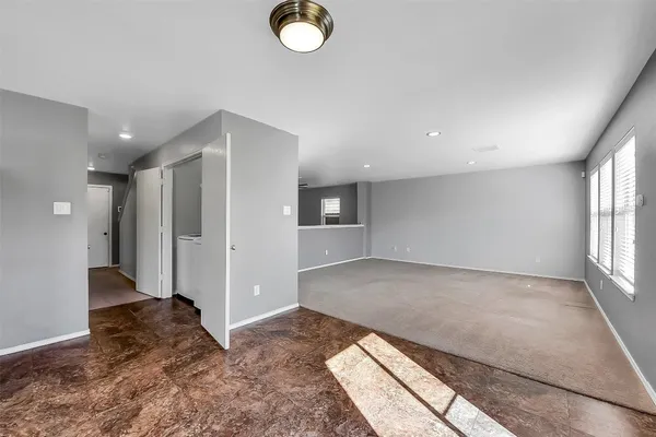 a view of a hallway with staircase