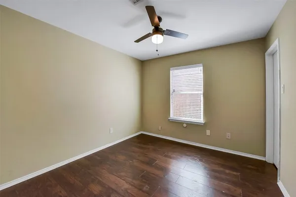 a large kitchen with cabinets and stainless steel appliances