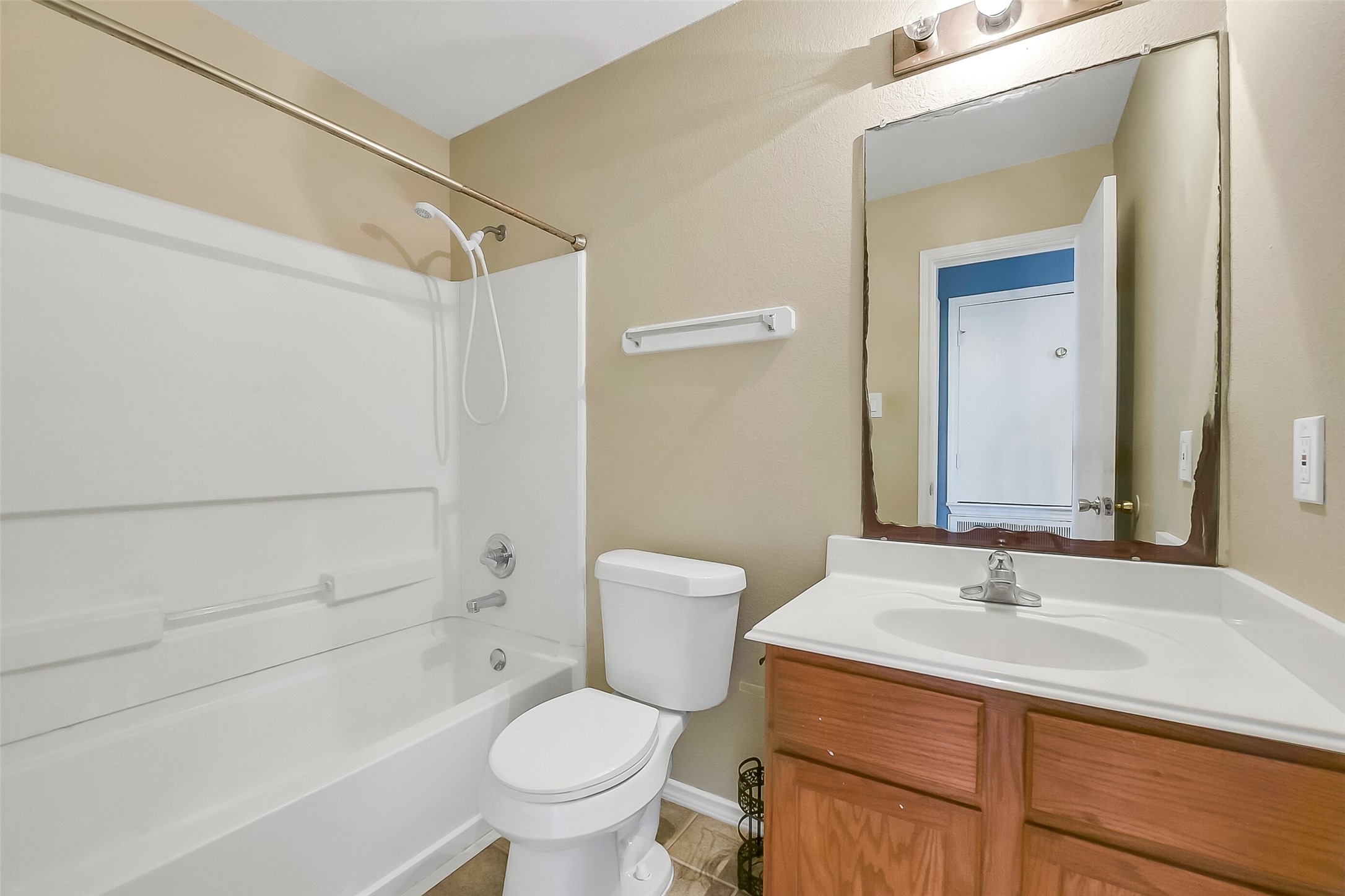 20011 Spring Wreath Lane Cypress, TX 77433 - Photo 15 of 39 Full bath downstairs with a tub-shower combo and clean, functional layout.