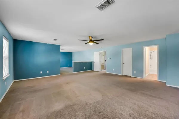 a view of a livingroom with a staircase