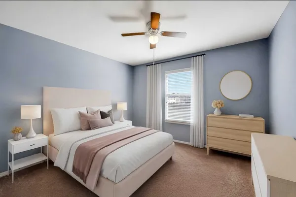 an empty room with a ceiling fan and window