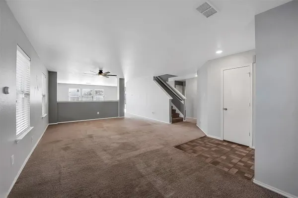 a picture of a bench in front of a wall