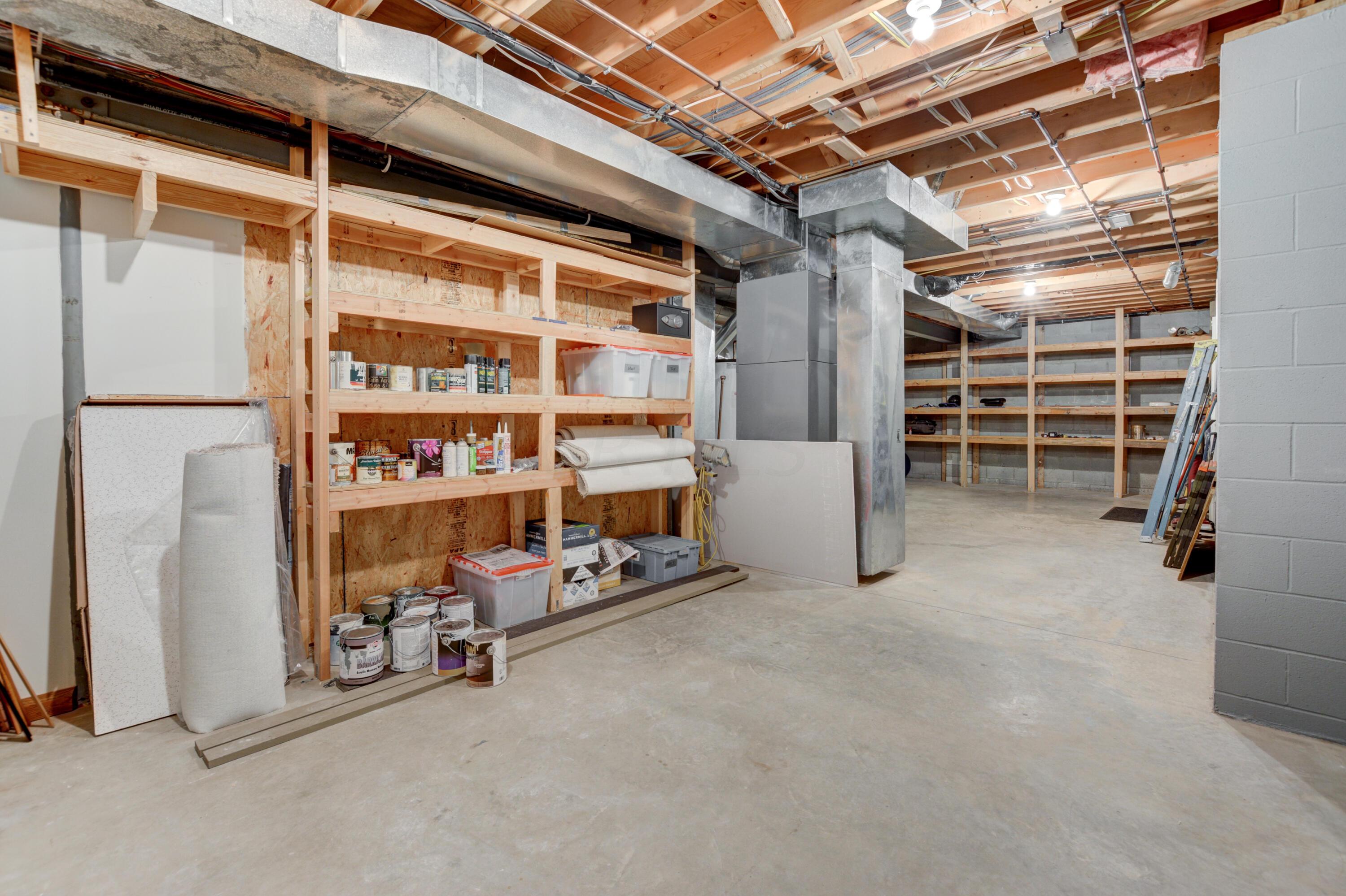 7263 Riverside Drive Powell, OH 43065 - Photo 51 of 55 Large Utility Room With Storage Racks
