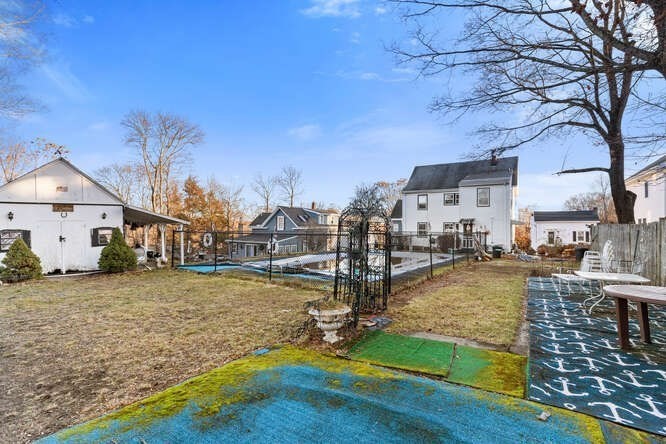 13 Highland Street Wakefield, MA 01880 - Photo 30 of 35 a view of a lake with houses