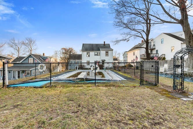 13 Highland Street Wakefield, MA 01880 - Photo 31 of 35 a view of a house with pool and sitting area