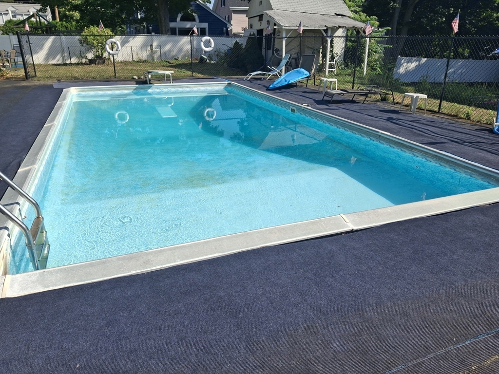 13 Highland Street Wakefield, MA 01880 - Photo 32 of 35 swimming pool view with a outdoor seating