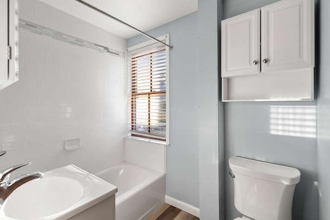 13 Highland Street Wakefield, MA 01880 - Photo 10 of 35 a bathroom with a sink toilet and tub