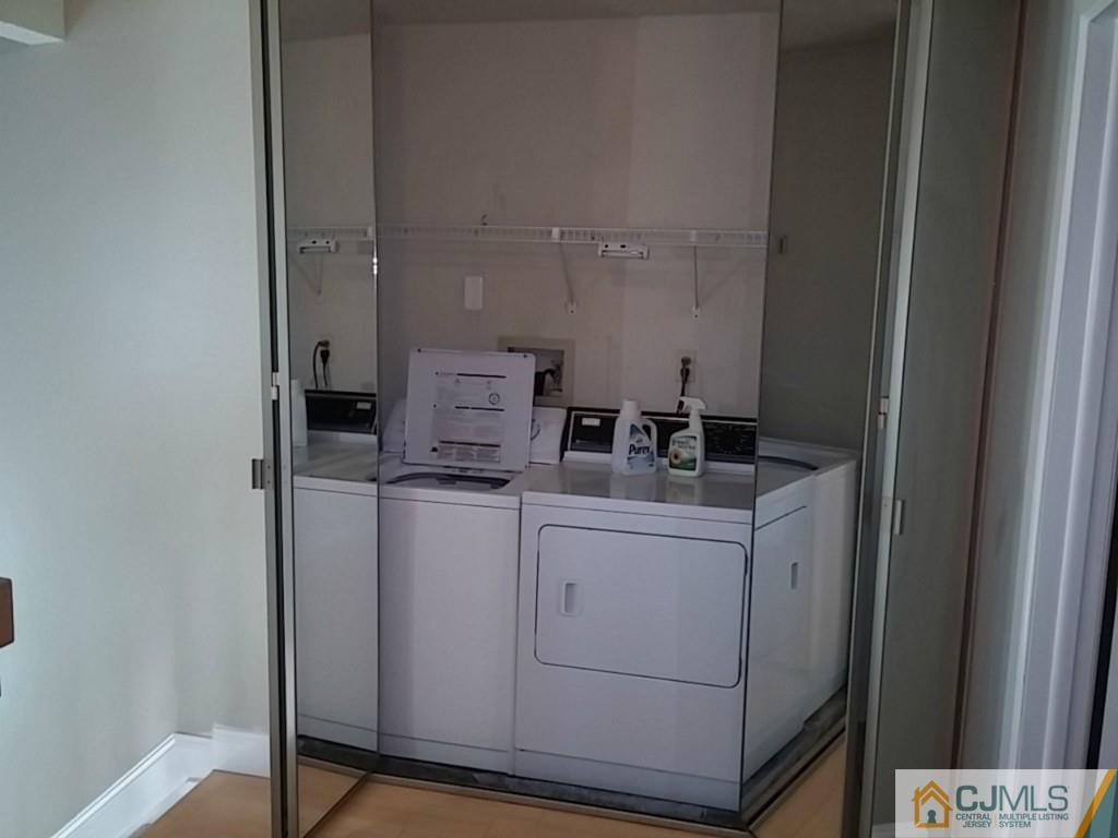 75 Park Gate Drive Edison, NJ 08820 - Photo 16 of 19 a utility room with dryer and washer