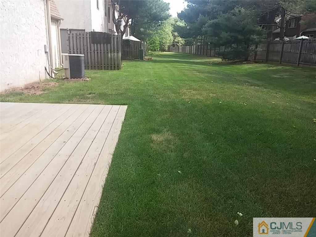 75 Park Gate Drive Edison, NJ 08820 - Photo 19 of 19 a view of a backyard with a garden