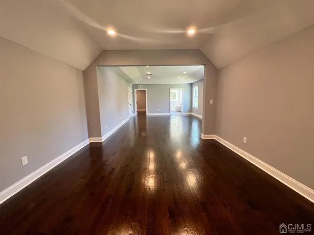 a view of gallery with wooden floor