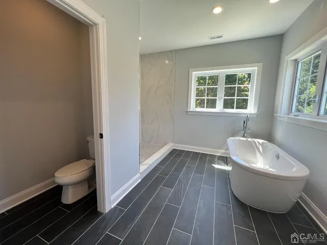 a bathroom with a sink and toilet