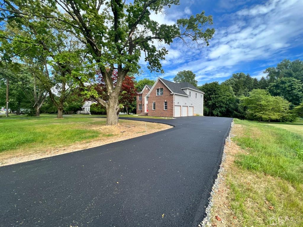 133 Old Beekman Road Monmouth Junction, NJ 08852 - Photo 40 of 42 a view of a house with a big yard