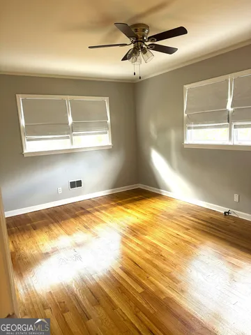 a view of a kitchen with a sink