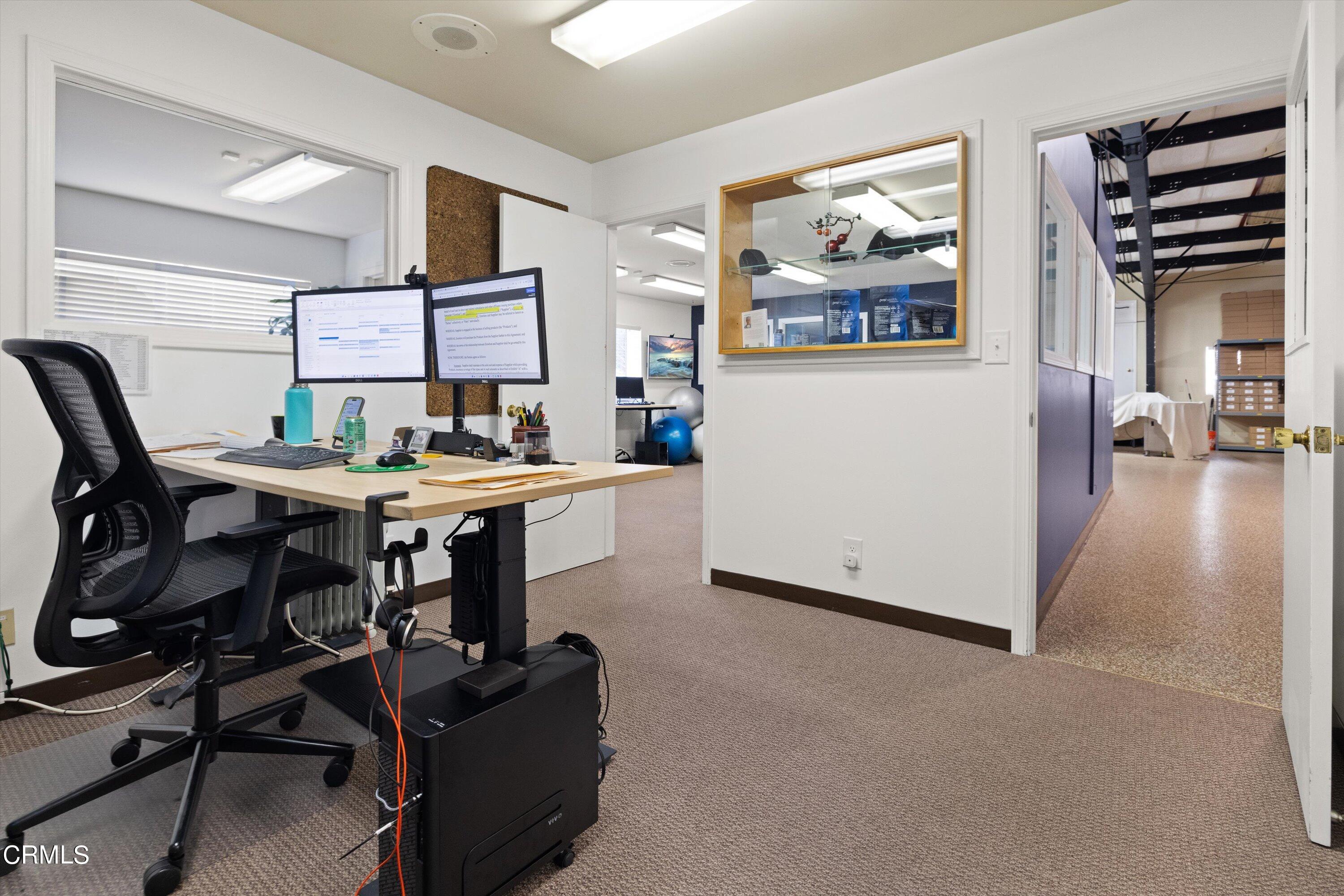 683 Maple Avenue Carpinteria, CA 93013 - Photo 33 of 39 a living room with furniture and wooden floor