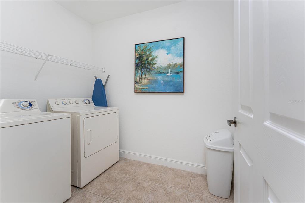 24351 Baltic Avenue, Unit 203 Punta Gorda, FL 33955 - Photo 38 of 51 a utility room with dryer and washer