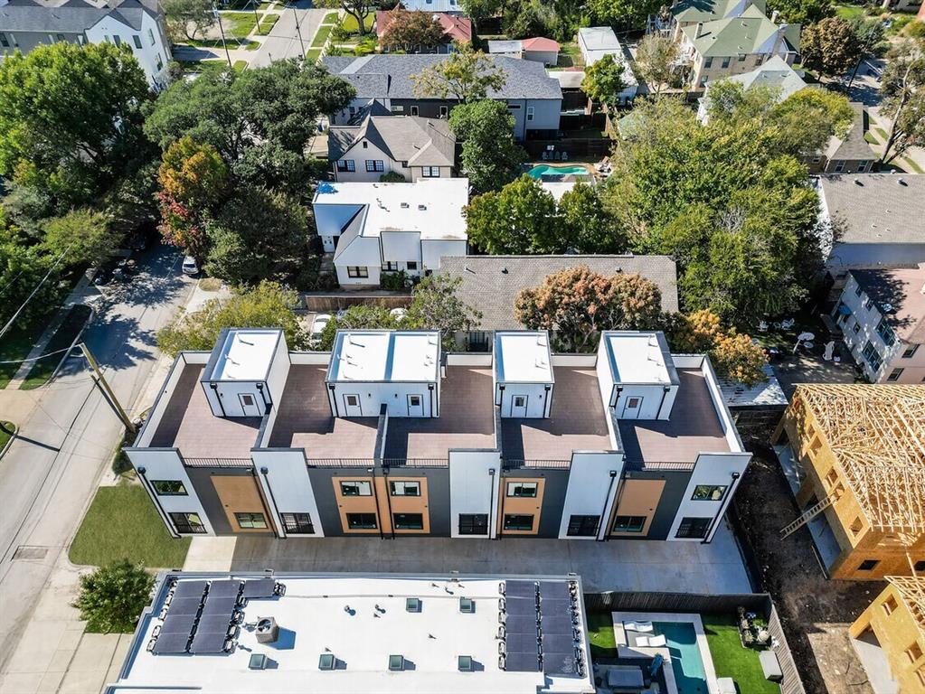 6001 Lewis Street Dallas, TX 75206 - Photo 3 of 19 an aerial view of multiple houses with yard