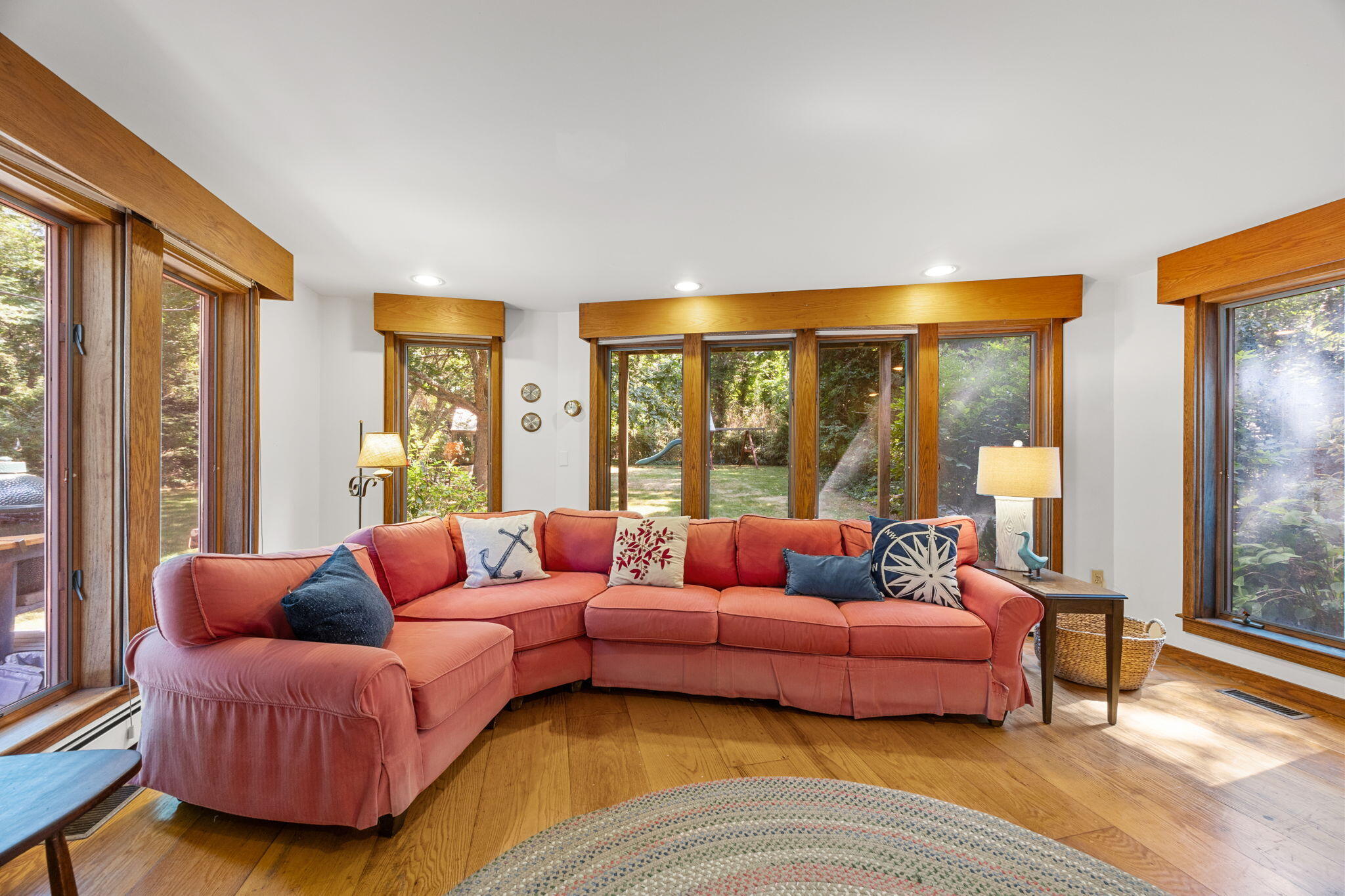 241 Tonset Road Orleans, MA 02653 - Photo 27 of 56 a living room with furniture and a large window